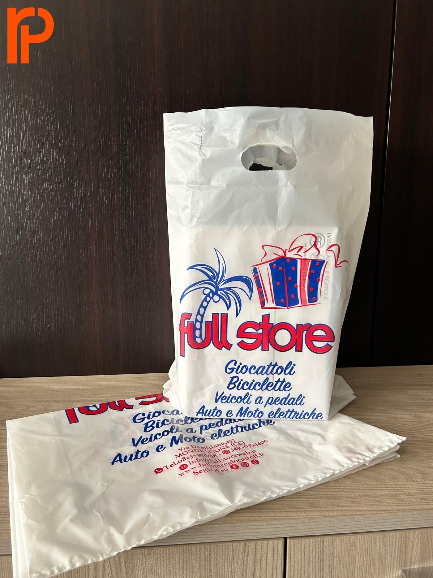 Busta personalizzata realizzata per Full Store, giocattoli e biciclette